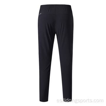 Pantalones de pista de corredera de entrenamiento sincero y seco